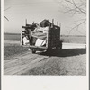 A truckload of household goods being moved off the farm of Everett Shoemaker, tenant farmer. Near Shadeland, Indiana