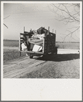 A truckload of household goods being moved off the farm of Everett Shoemaker, tenant farmer. Near Shadeland, Indiana