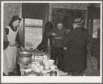 Lunch at the closing-out sale on Frank Sheroan's farm near Montmorenci, Indiana