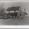 Everett Shoemaker, tenant farmer near Shadeland, Indiana, moving his household goods from the farm