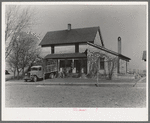 Everett Shoemaker, tenant farmer near Shadeland, Indiana, moving his household goods from the farm