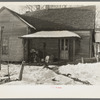 Backporch of Randall Golsom's farm near McLeansboro, Illinois