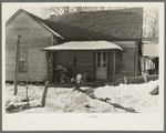 Backporch of Randall Golsom's farm near McLeansboro, Illinois