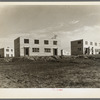 A group of houses at the Greenhills project. Ohio. These buildings have asbestos board siding