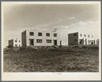 A group of houses at the Greenhills project. Ohio. These buildings have asbestos board siding