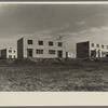 A group of houses at the Greenhills project. Ohio. These buildings have asbestos board siding