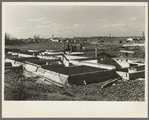 Men working on the foundations of a house at the Greenhills project. Ohio