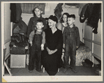 Group of children being cared for by an old lady; all of them flood refugees. Sikeston, Missouri