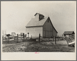 Corncrib on the one hundred sixty acres owned and operated by August Grettencord. This farm southwest of Fowler, Indiana, carries a small mortgage