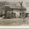 House on the farm rented by Erasty Emvich. Near Battlefield [i.e. Battle Ground?], Indiana. Emvich repaired this house at his own expense when he moved in. There were no windows or doors and the roof had holes three feet wide