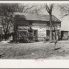 House on the farm rented by Erasty Emvich. Near Battlefield [i.e. Battle Ground?], Indiana. Emvich repaired this house at his own expense when he moved in. There were no windows or doors and the roof had holes three feet wide