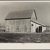 Barn on the land of Sylvester Garring, thirty-one-year-old tenant farmer. Garring built the addition to the barn to house his cattle. The landlord paid for the lumber. Near Fowler, Indiana