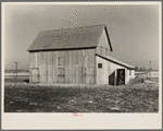 Barn on the land of Sylvester Garring, thirty-one-year-old tenant farmer. Garring built the addition to the barn to house his cattle. The landlord paid for the lumber. Near Fowler, Indiana