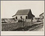 Barn on the farm rented by August Feck. Near Templeton, Indiana. Feck has been a tenant on this farm for the past twelve years and has had to do much building and repairing at his own expense, but he has never been given more than a one year lease