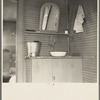 Washing facilities in the home of Elmer Johnson, hired farmhand. Near Battle Ground, Indiana. His employer has a bathroom in a modern house