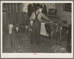 One of Erasty Emvich's sons weaving a rug in farmhouse near Battle Ground, Indiana. Mr. Emvich, tenant farmer and father of twelve children, also weaves in his spare time