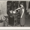 Mrs. Erasty Emvich in her kitchen. Mrs. Emvich is the wife of a tenant farmer and mother of twelve children, eleven of them living. Near Battle Ground, Indiana