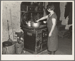 Mrs. Erasty Emvich in her kitchen. Mrs. Emvich is the wife of a tenant farmer and mother of twelve children, eleven of them living. Near Battle Ground, Indiana