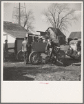 Charles Miller, for twelve years a hired farm hand, moving his household goods onto the farm he has now rented to work for himself. Northeast of Fowler, Indiana