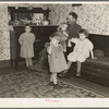Tip Estes, Indiana hired hand, with four of his nine children. Near Fowler