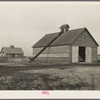 Corncrib and one of the two barns on Roy Conner's owner-operated farm near Templeton, Indiana. This one hundred sixty acre farm is under a small mortgage