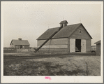 Corncrib and one of the two barns on Roy Conner's owner-operated farm near Templeton, Indiana. This one hundred sixty acre farm is under a small mortgage