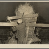 6:45 p.m. Tip Estes, hired man near Fowler, Indiana, pitching hay into feeding racks. Many cattle are fed on this farm