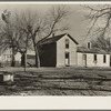 Unoccupied farmhouse on a farm near Fowler, Indiana. This farm is rented by a large operator and the land is cultivated