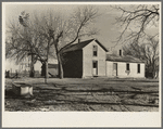 Unoccupied farmhouse on a farm near Fowler, Indiana. This farm is rented by a large operator and the land is cultivated