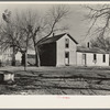 Unoccupied farmhouse on a farm near Fowler, Indiana. This farm is rented by a large operator and the land is cultivated