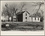 Unoccupied farmhouse on a farm near Fowler, Indiana. This farm is rented by a large operator and the land is cultivated