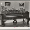 Old square piano in a home at Eldorado, Illinois