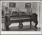 Old square piano in a home at Eldorado, Illinois