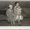A mother and her children, refugees from the 1937 flood, encamped at Tent City near Shawneetown, Illinois