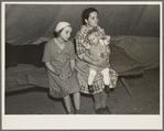 A mother and her children, refugees from the 1937 flood, encamped at Tent City near Shawneetown, Illinois