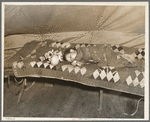 A child flood refugee taking a nap. Tent City near Shawneetown, Illinois