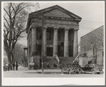 Bank in Shawneetown, Illinois, built by state in 1839. Note water tank (for drinking water purposes) on sidewalk, left
