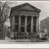 Bank in Shawneetown, Illinois, built by state in 1839. Note water tank (for drinking water purposes) on sidewalk, left