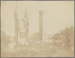 Ruins of a church façade, bell tower and graveyard