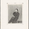 Portrait of a man sitting in chair