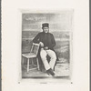 Portrait of a man in a hat and leaning on second chair