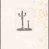Two ornate candlestick holders