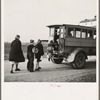 Tip Estes' children boarding a school bus near Fowler, Indiana