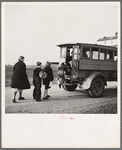 Tip Estes' children boarding a school bus near Fowler, Indiana