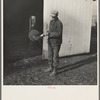 Tip Estes oils the spade before he puts it away. Near Fowler, Indiana