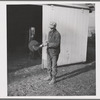 Tip Estes oils the spade before he puts it away. Near Fowler, Indiana