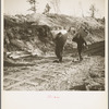 Lumberjacks with mattresses and equipment which they are returning to camp. They have been living in their own shacks. Forest County, Wisconsin