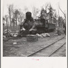 Lumber camp locomotive. Forest County, Wisconsin. Note special smokestack to catch sparks