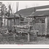 Stand for strapping in horses while being shod. Forest County lumber camp. Wisconsin