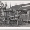 Stand for strapping in horses while being shod. Forest County lumber camp. Wisconsin